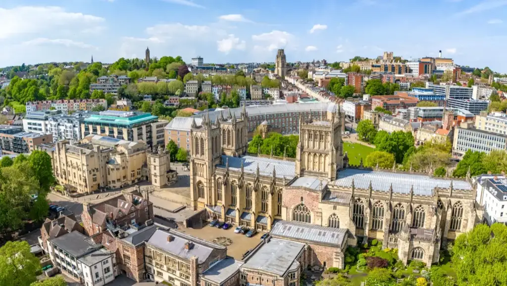 Aerial view over Bristol rooftops and landmarks