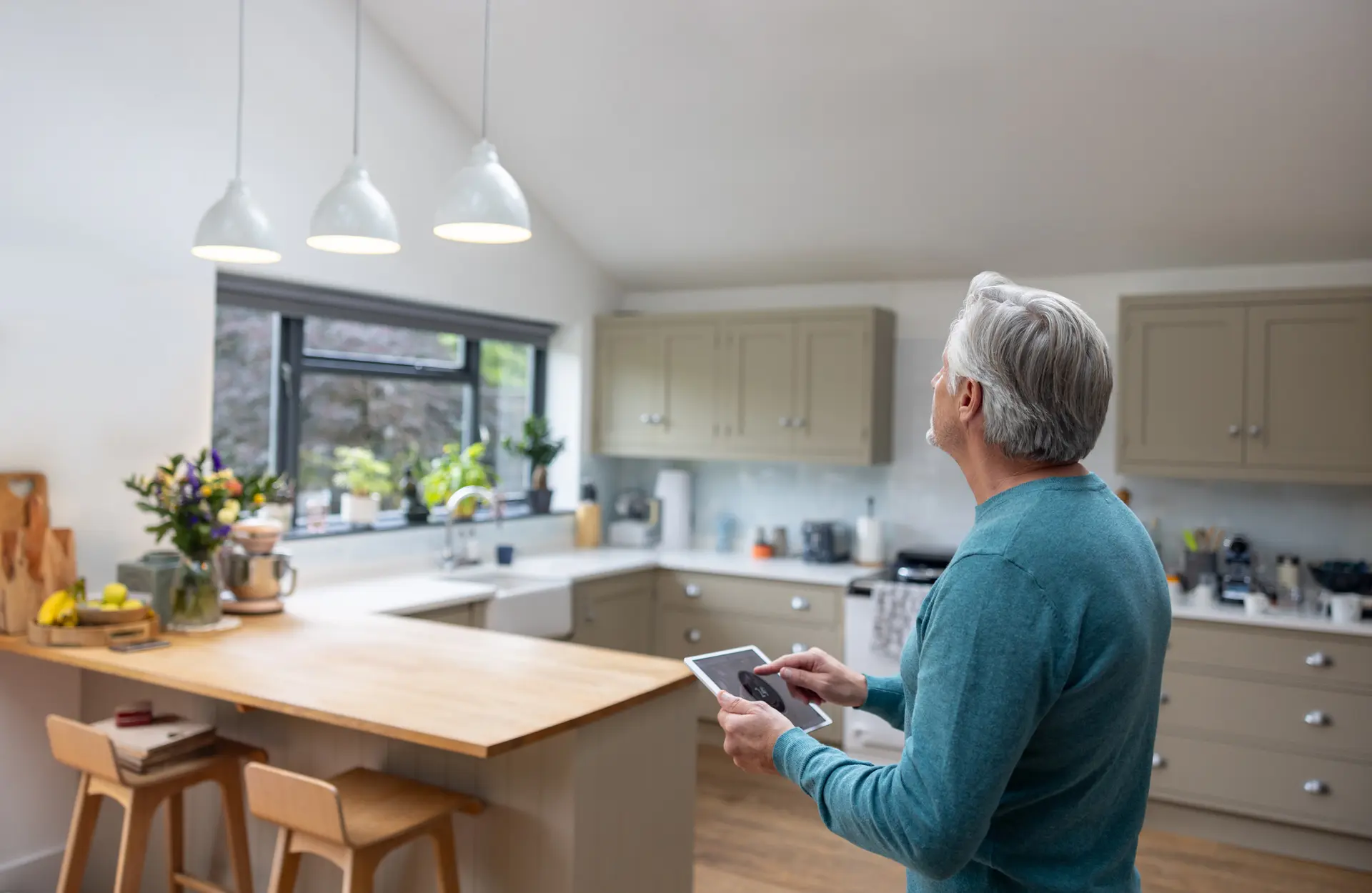A property manager reviewing bookings and performance on a tablet